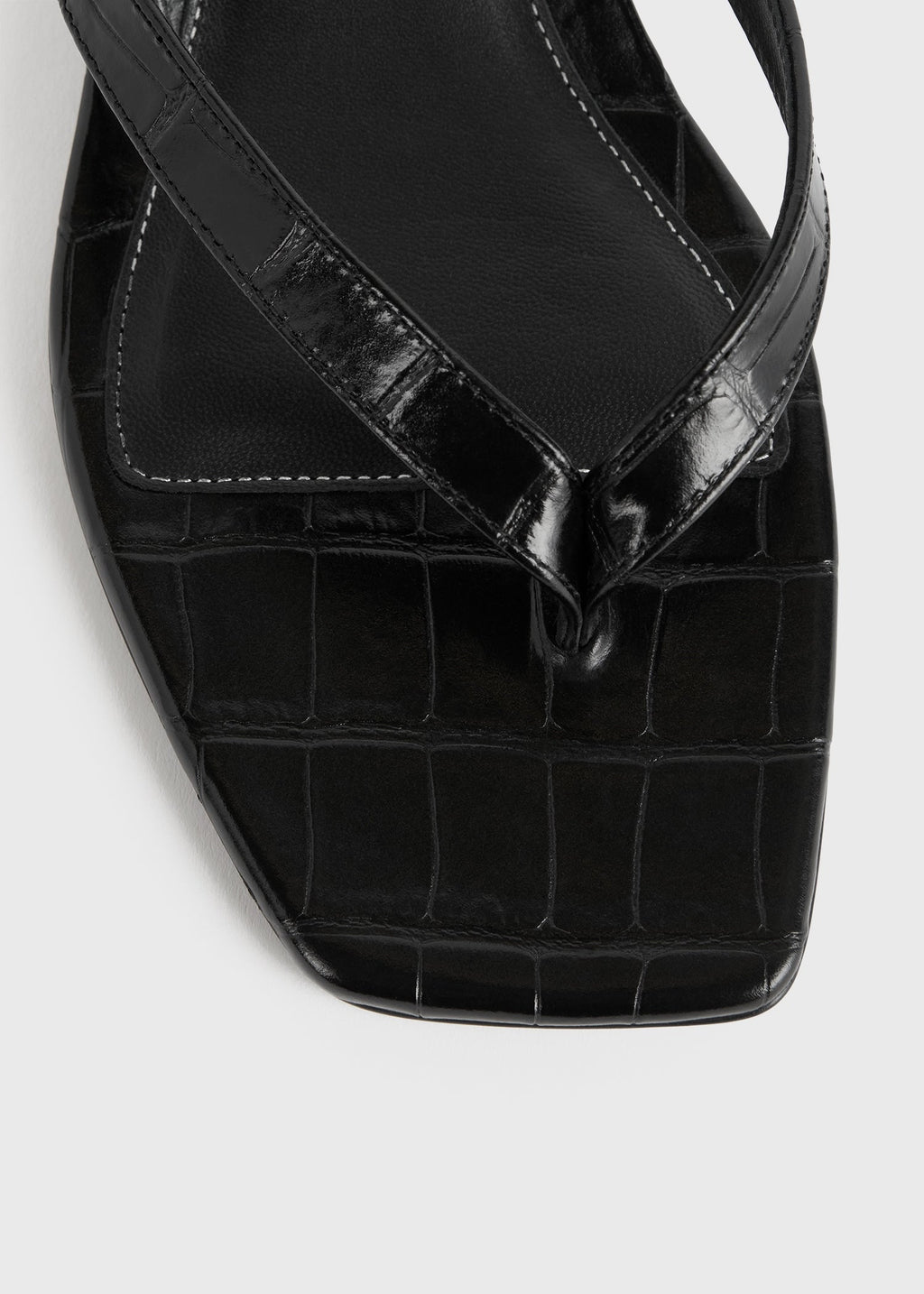 Croco-embossed heeled flip flops black